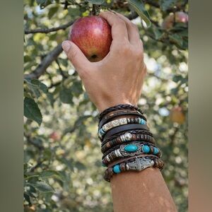 6 separate small faux leather bracelets decorative southwest designs braided